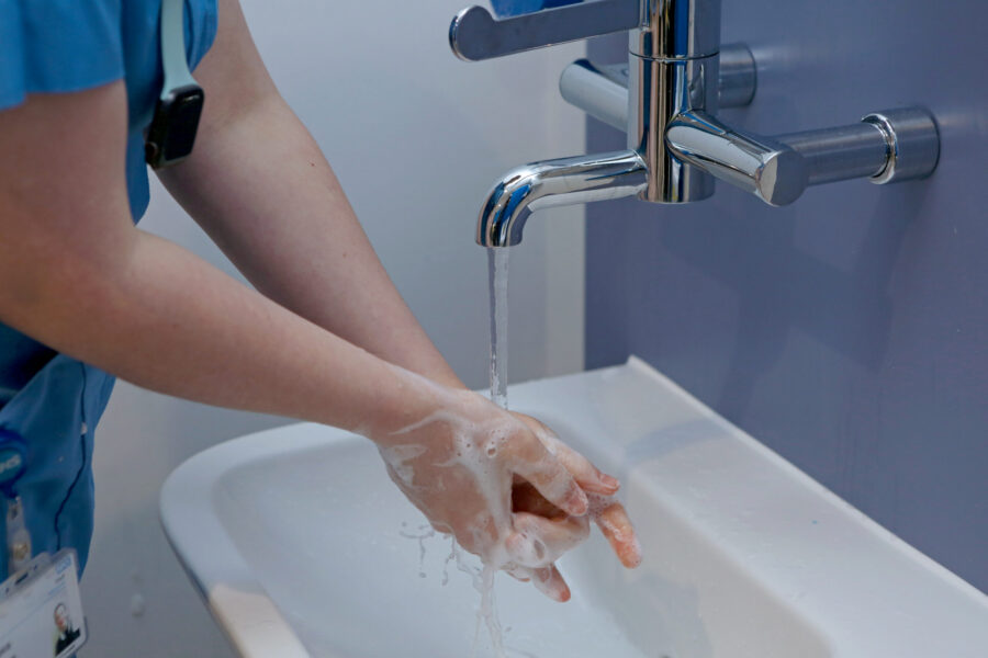 Hands being washed