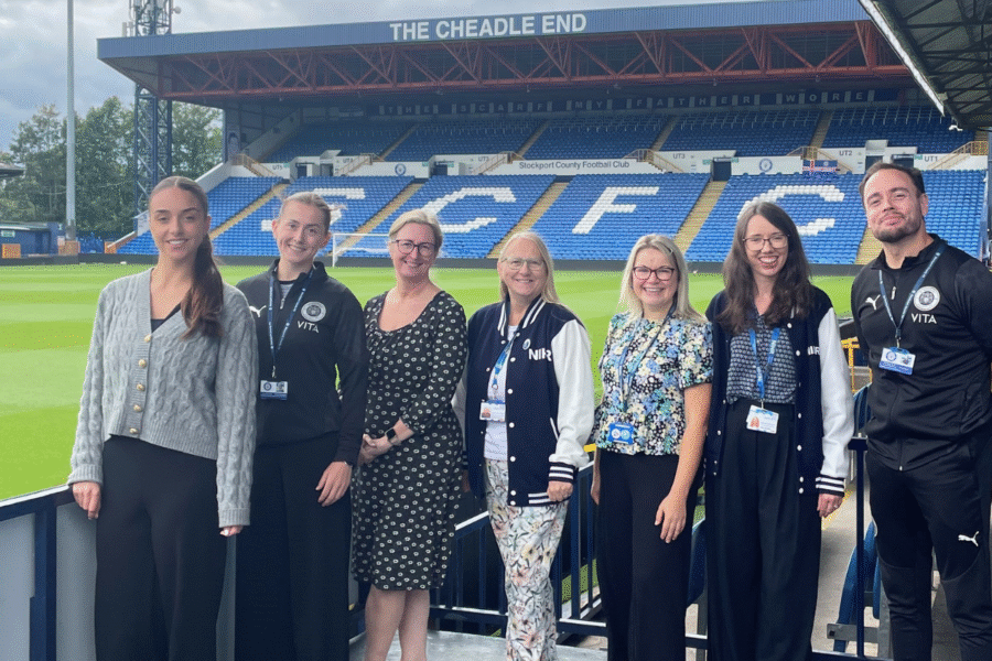 Stockport County Trust and NHS research partners together at Stockport County ground
