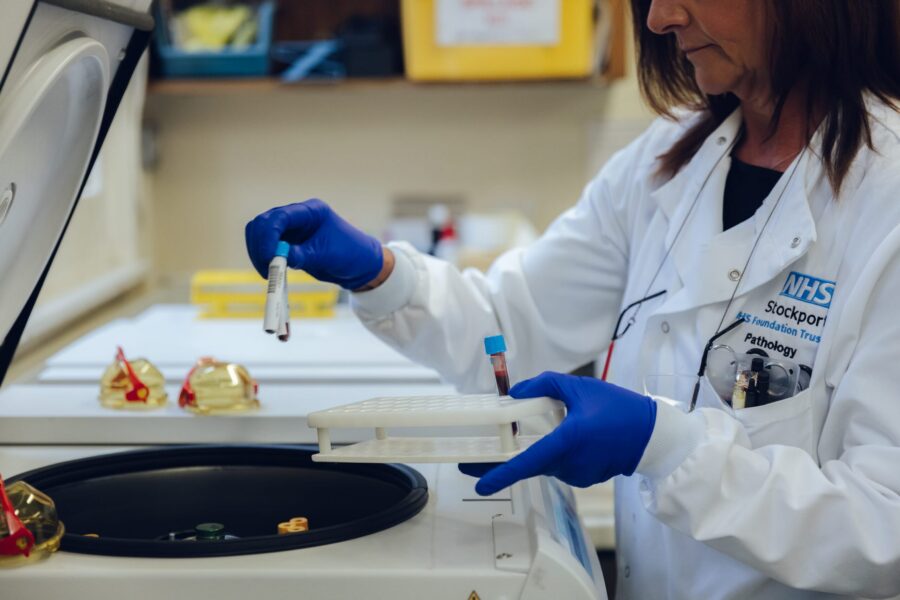 Scientist with test tube